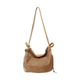 A convertible lightweight backpack duffel bag in a brown checkered pattern with a single adjustable strap.