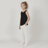 A youth singlet in black, styled with white pants and white shoes, featuring a logo.