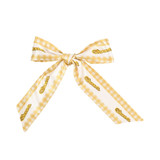 A satin narrow scarf in a yellow and white gingham pattern, tied in a bow, featuring a brand logo.