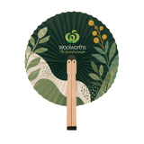 A shaped wooden paper fan in green and cream, featuring floral patterns and a logo on the front.