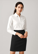 A white button-up long sleeve shirt paired with a black skirt, featuring a logo on the shirt.