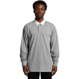 A long-sleeved rugby jersey in grey with a white collar. The jersey features a logo on the chest area. A long-sleeved rugby jersey in grey with a white collar. The jersey features a logo on the chest area.