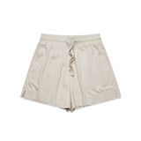 A pair of beige sports shorts with an elastic waist and side slits. The shorts have a logo on them.