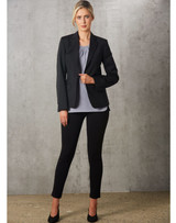 A light grey ladies' round neck top with pleats, paired with a black blazer and black trousers.
