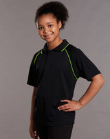 A black polo shirt with green accents, featuring a collar and short sleeves, displayed by a smiling child.