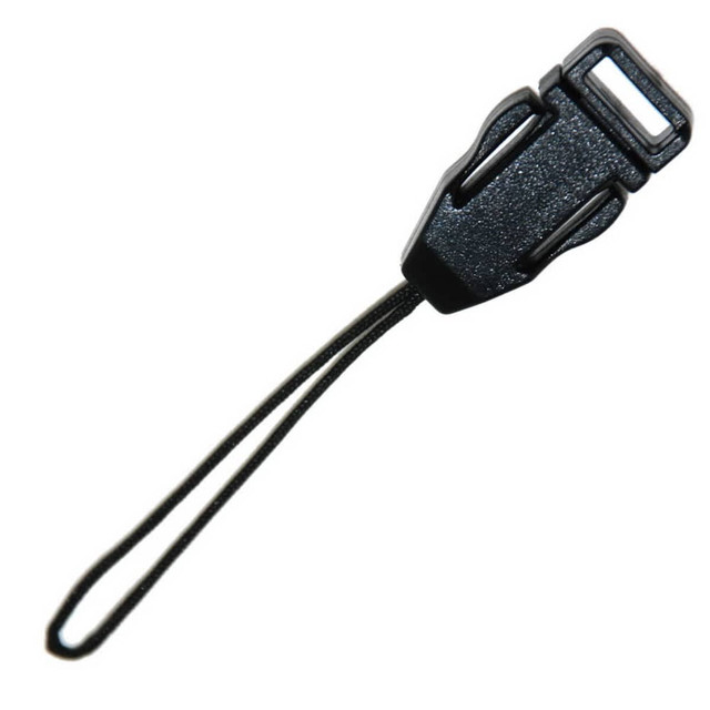 A black detachable phone holder with a looped attachment strap, featuring a textured finish. A black detachable phone holder with a looped attachment strap, featuring a textured finish.