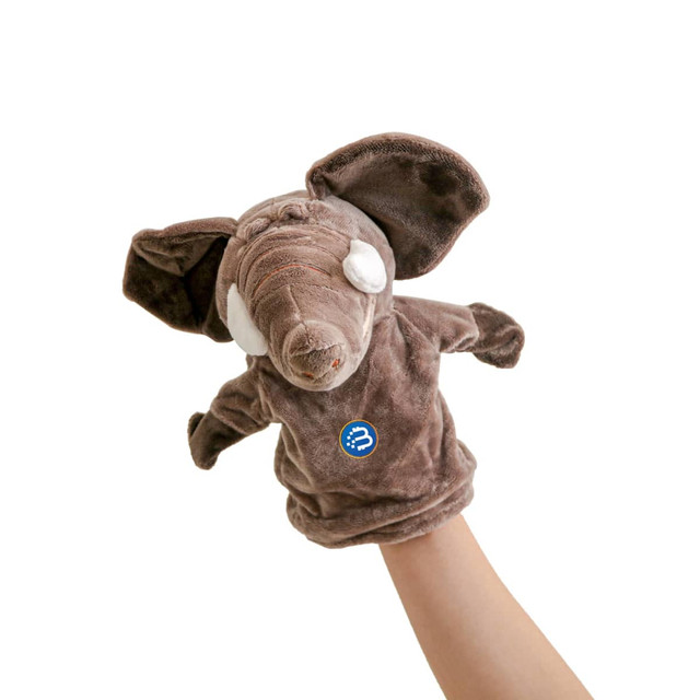 A plush elephant hand puppet in brown with large ears and white details, featuring a logo on the body.