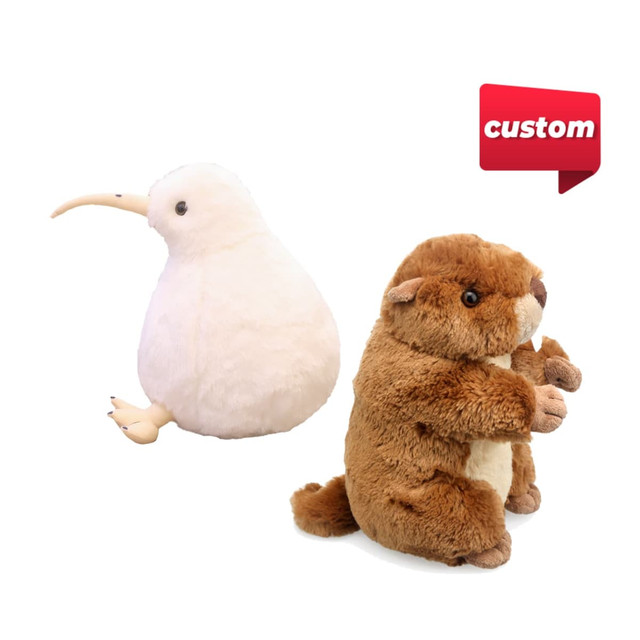 A white plush kiwi bird and a brown plush animal with smaller companions, both featuring customised designs.
