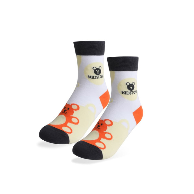 Colourful woven socks featuring a playful bear pattern, with a logo, in shades of yellow, orange, and black.