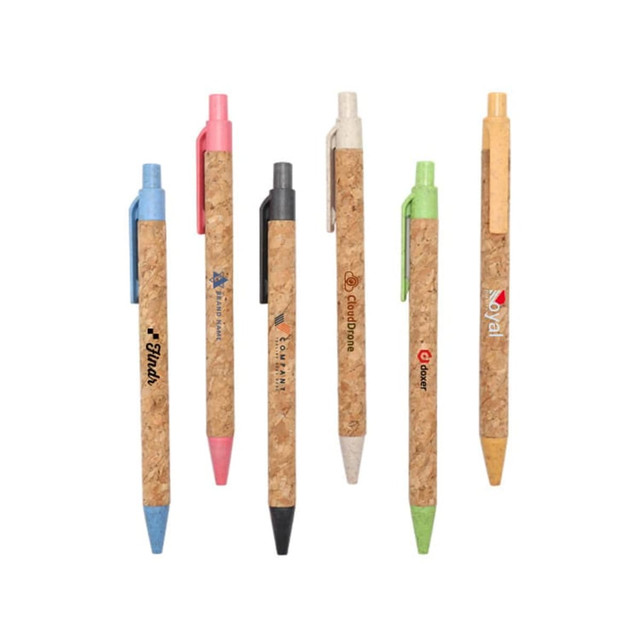 A collection of eco-friendly cork pens in various colours including blue, pink, black, and green, each with branding.