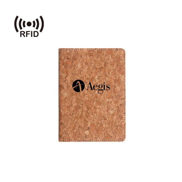 A cork passport holder with a black logo, featuring RFID protection. The holder showcases a natural cork texture.