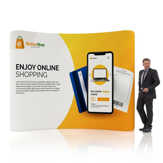 Curved tension fabric display wall in orange and yellow featuring a digital shopping theme and a person standing beside it.