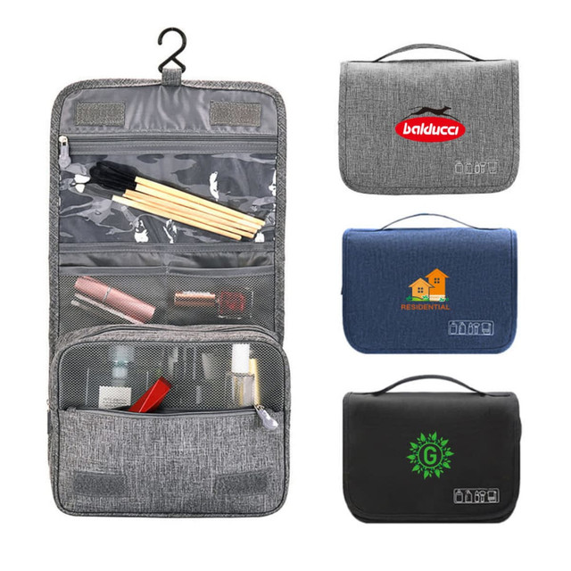 A grey travel hanging toiletry bag with multiple compartments, featuring mesh pockets and a hanging hook.