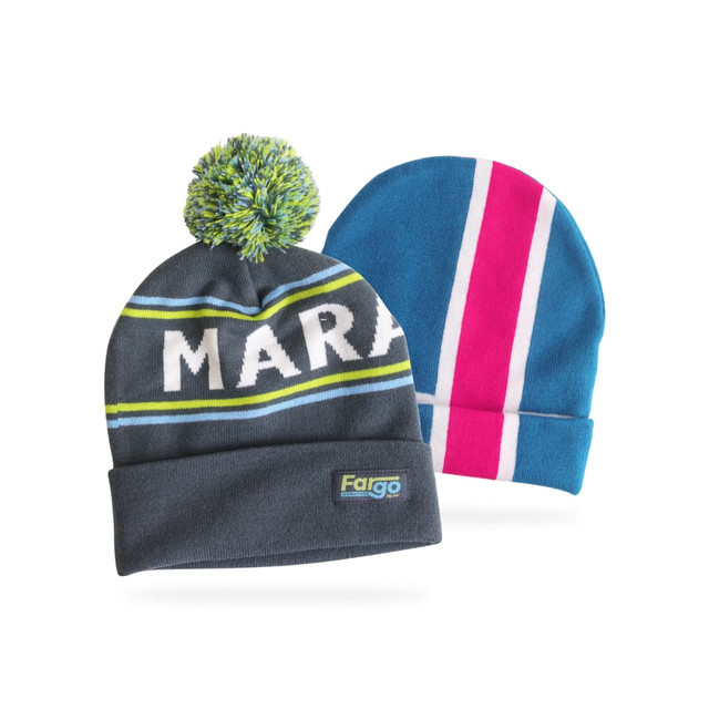 Two fully custom knitted beanies: one grey with a pom-pom and stripes, and a blue one with pink and white stripes.