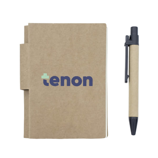 A brown recycled notebook with a black pen positioned beside it, featuring a logo on the cover.