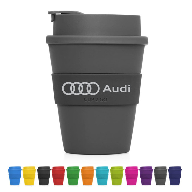 A drink bottle in grey with a removable lid and silicone sleeve, alongside various coloured cups.