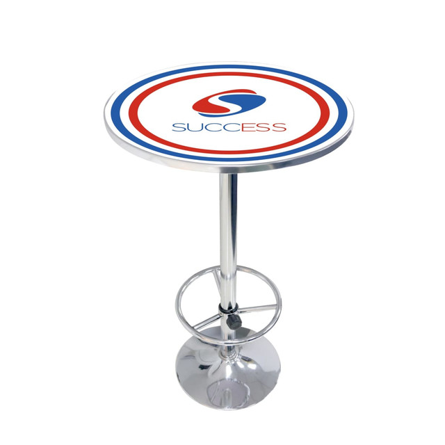 A round bar table with a chrome base, featuring a circular top in red, white, and blue with a logo.