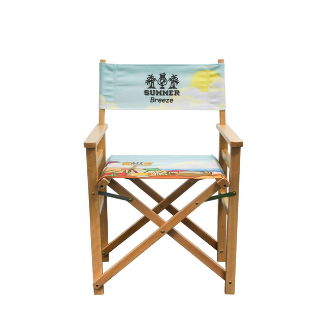 A wooden director's chair in light blue and colourful fabric with a logo on the backrest.