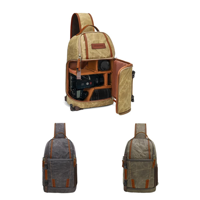 A waxed canvas camera sling bag in sand and grey, featuring padded compartments for camera equipment and a logo.