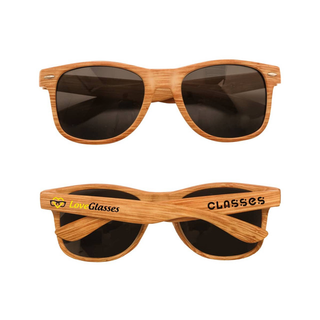Wooden sunglasses in a light brown finish with dark lenses and a logo on the side.