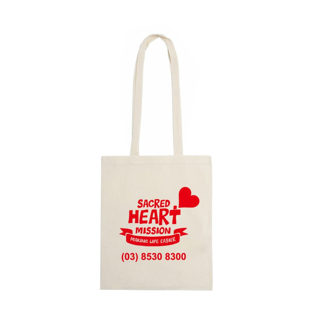 A beige calico bag featuring long handles and a logo with red text.