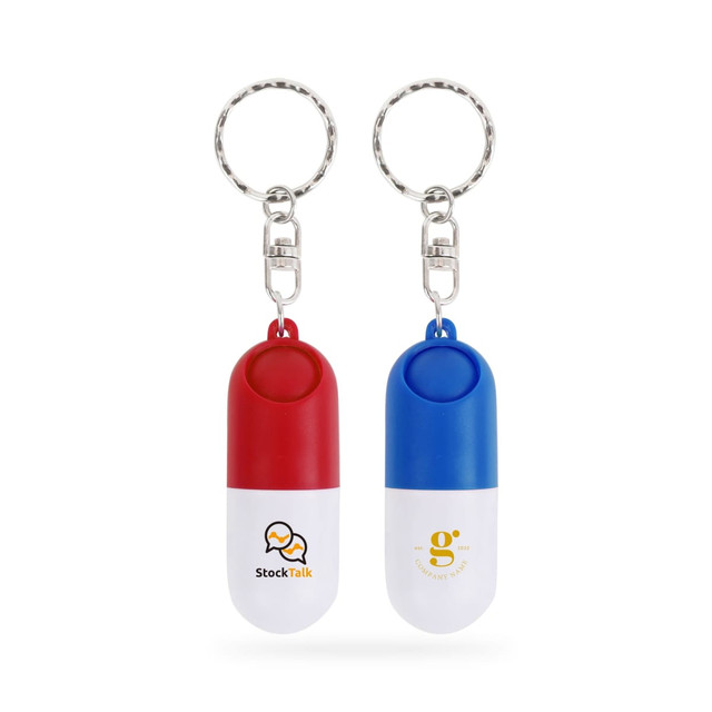 A red and white pill capsule keychain alongside a blue and white pill capsule keychain, both with logos.