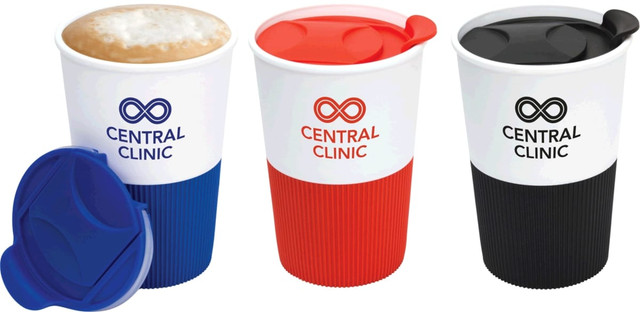 A set of three coffee mugs in red, blue, and black, each with a matching lid and a textured grip band. Each mug has a logo.