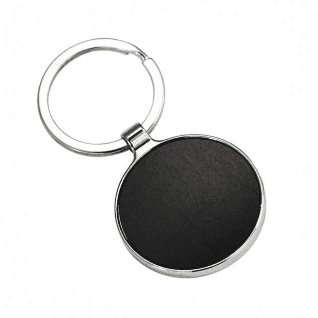 A round black keyring with a silver metallic border and a keyring attachment. A round black keyring with a silver metallic border and a keyring attachment.