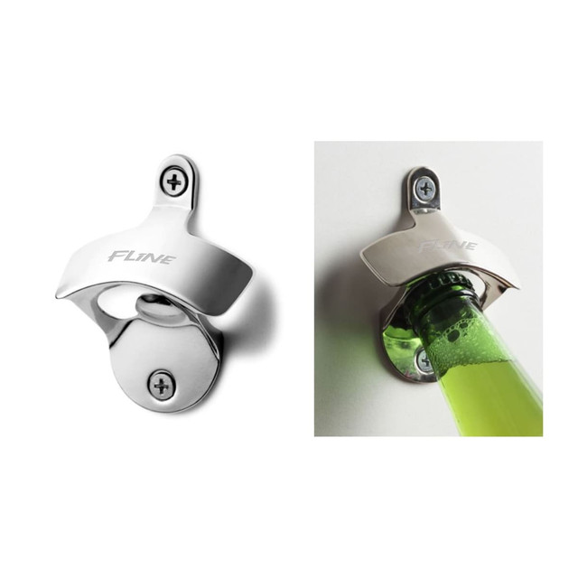 A drink bottle opener in silver with a sleek design, featuring a logo and mounted on a wall.
