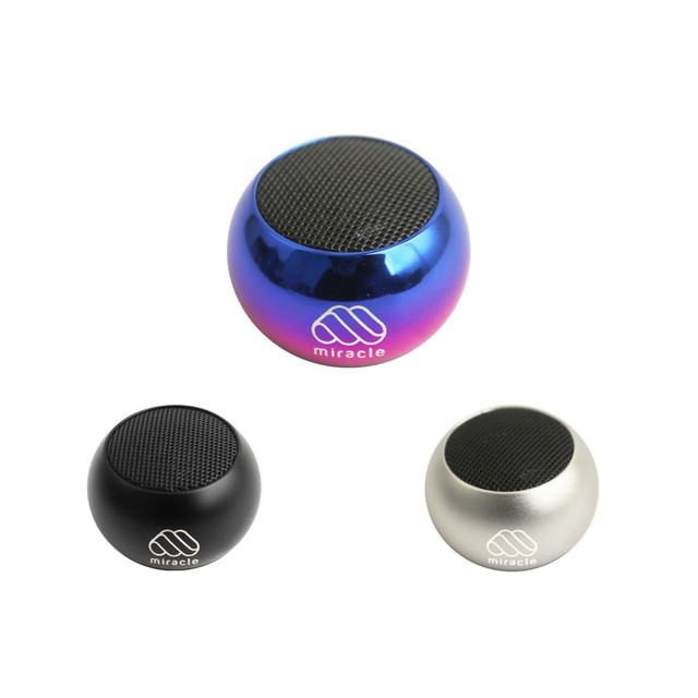 Three Mini Bass Wireless Speakers in blue, black, and silver. Each has a mesh top and a logo on the front.