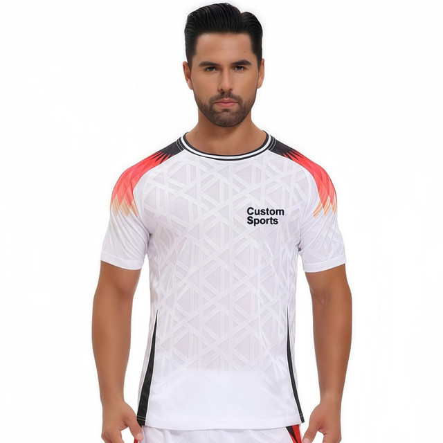 A breathable crew neck raglan T-shirt in white with orange and black accents, featuring a logo on the front.