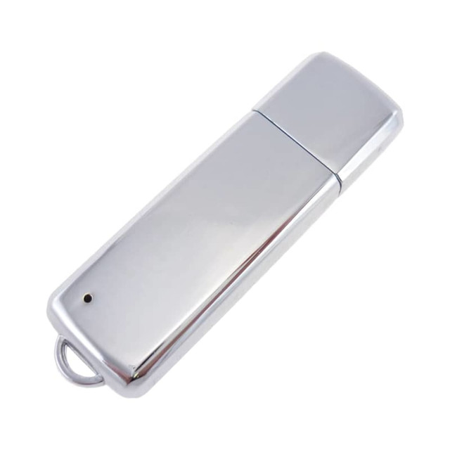 A sleek silver metal flash drive with a smooth surface and a loop for attaching to a keychain.