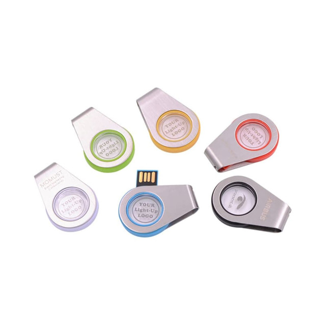 A collection of six light-up flash drives in silver with coloured accents, featuring various logos on the surface.