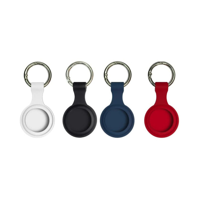 A set of four silicone Airtag cases in white, black, navy blue, and red, each with a metal keyring.