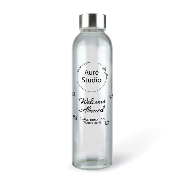 A drink bottle made of clear glass with a silver lid and a logo printed on the side.