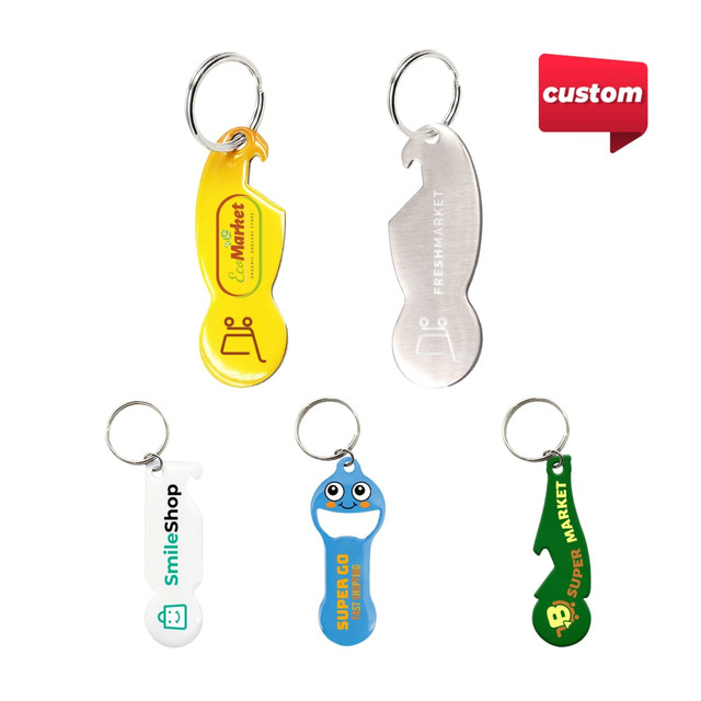 A collection of custom shape trolley coin keyring bottle openers in yellow, silver, blue, and green, featuring various logos.
