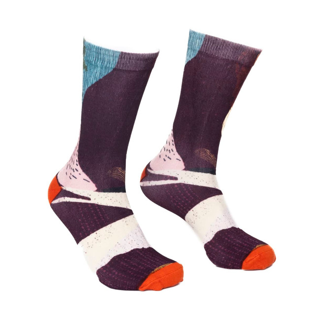 Crew sublimated socks featuring a multicoloured abstract design with shades of purple, orange, and blue, alongside a logo.