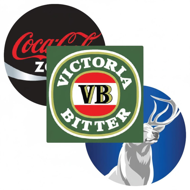 Three round coasters featuring designs: one green with 'Victoria Bitter', one black with a logo, and one blue with a deer.