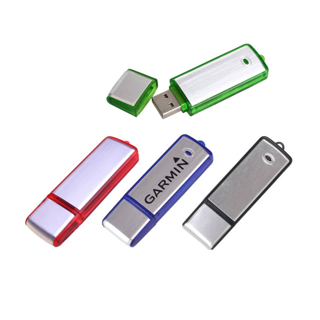 A collection of four multicoloured flash drives in red, green, and blue, with silver metal casing and a logo.