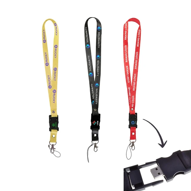 Three lanyard flash drives in yellow, black, and red, featuring clips and a USB connector. Each has a logo.