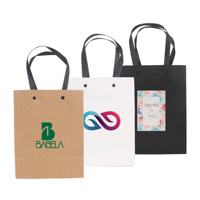 A small vertical paper bag with knitted handles, available in brown, white, and black, featuring various designs and a logo.