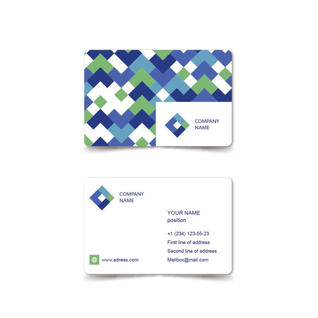 A PVC business card featuring a geometric pattern in blue, green, and white, with a logo present.