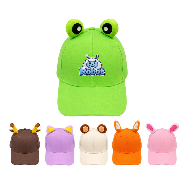 A green baseball hat with frog ears and five additional animal ear hats in brown, purple, beige, orange, and pink.