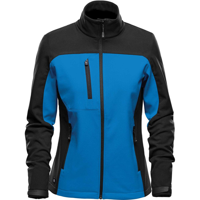 A women's softshell jacket in blue and black with a zippered pocket and a high collar. It features a logo.