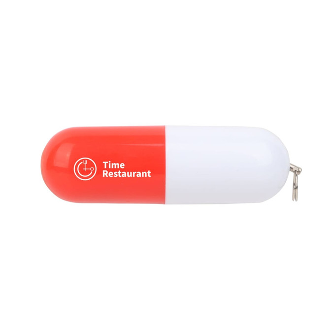 A red and white pill-shaped flash drive featuring a logo on its surface. It has a keyring attachment.