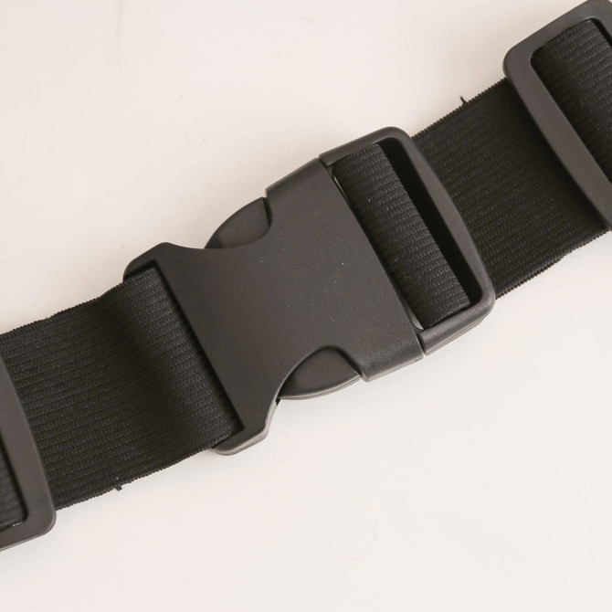 A black running belt featuring adjustable straps and a plastic buckle for secure fastening.