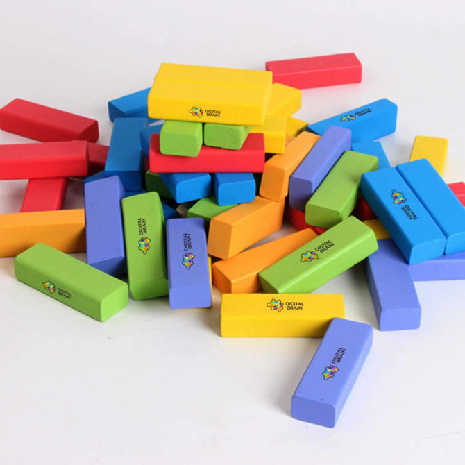 A colourful collection of stacked and scattered blocks in yellow, green, purple, red, and blue, with various logos.