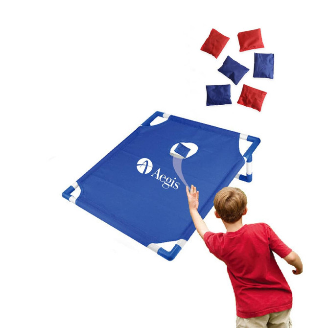 A portable blue cornhole game board with a logo and red and blue bean bags.
