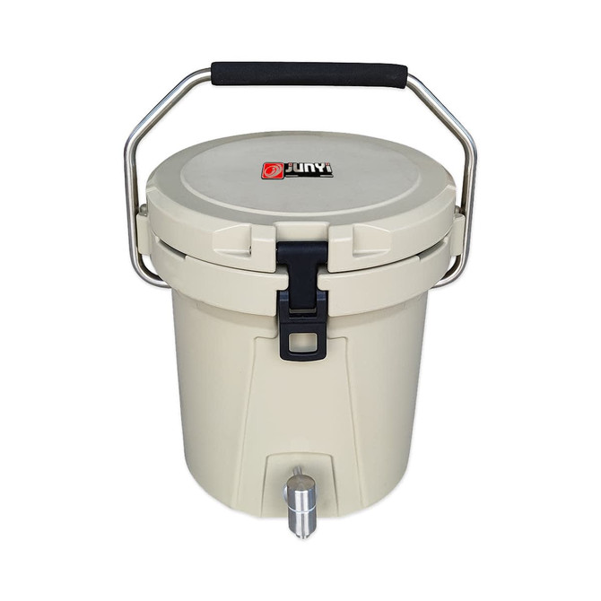 A cream-coloured ice bucket with a faucet and a sturdy handle. It features a locking mechanism and a logo.
