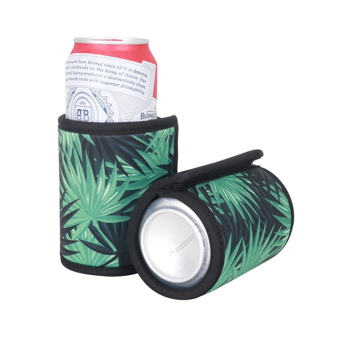 A drink bottle holder in green with a palm leaf pattern, featuring a Velcro wrap design. It holds a can inside.